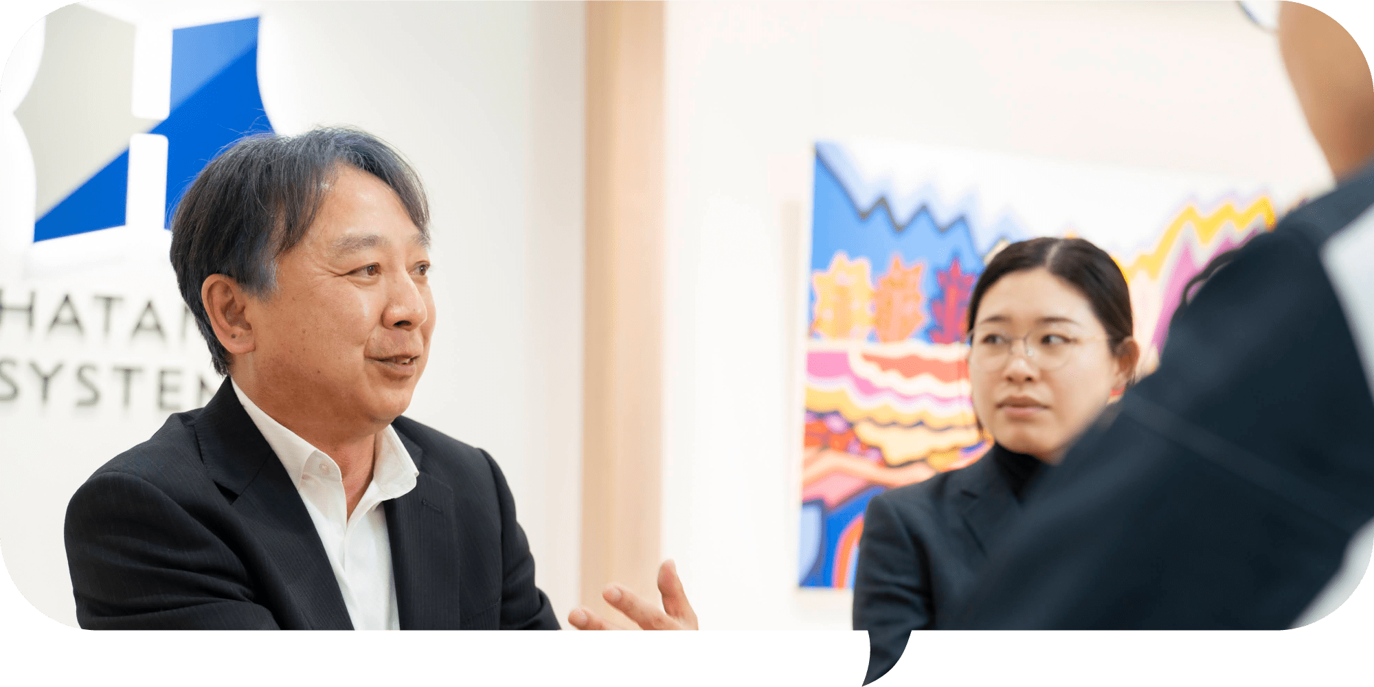 インタビューを受ける先輩社員