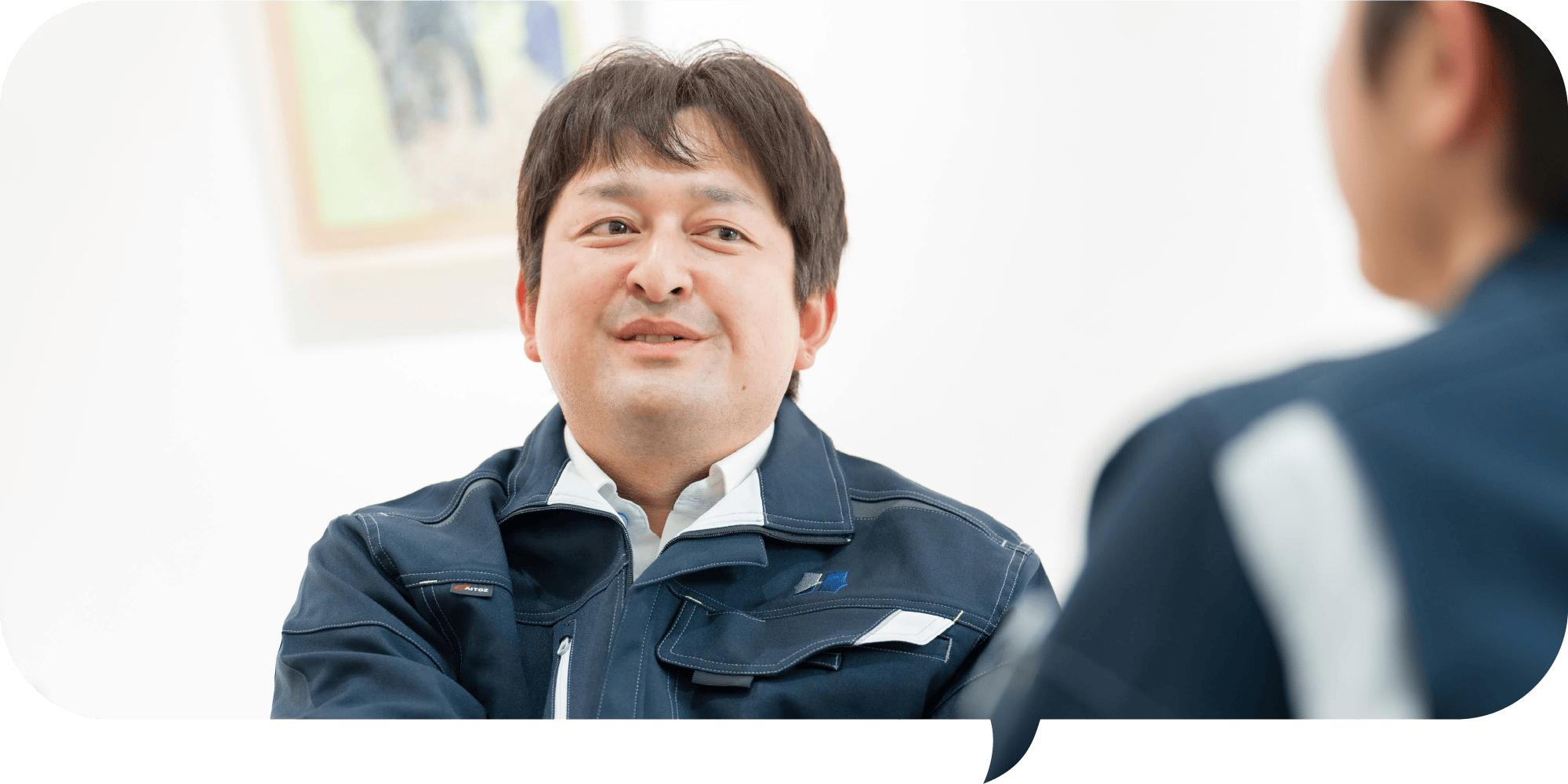 インタビューを受ける先輩社員
